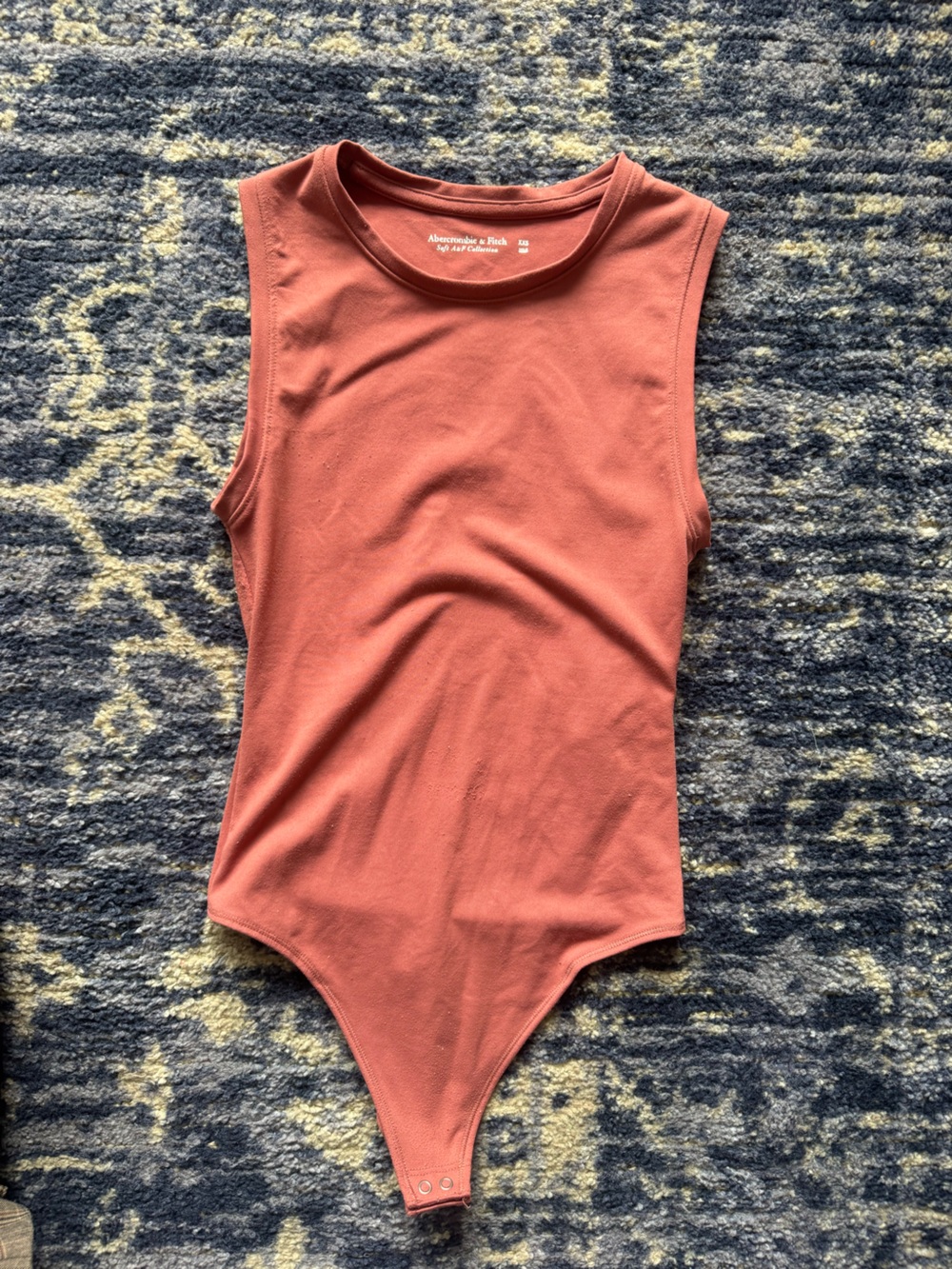 Sleeveless Ribbed Bodysuit in mauve